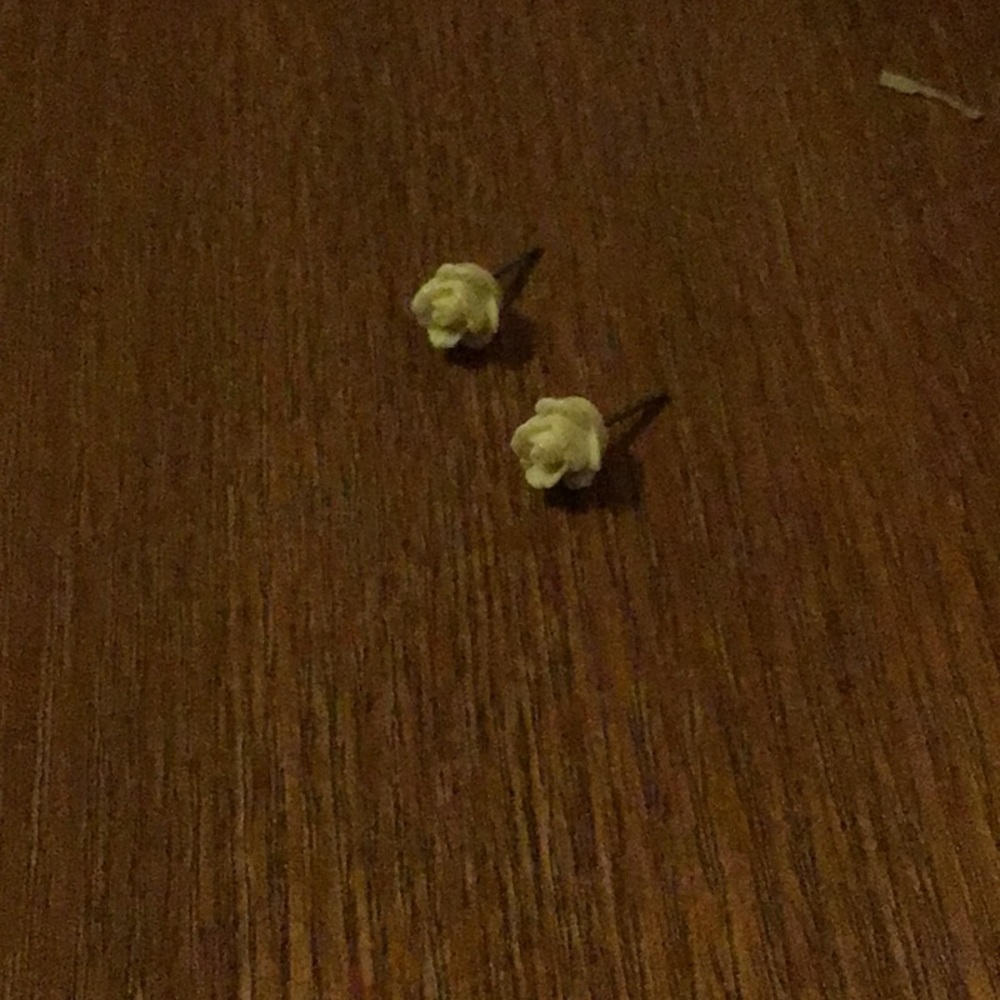 White rose earrings will come with backs
